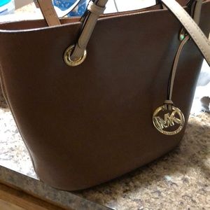 Micheal Kors brown bag.